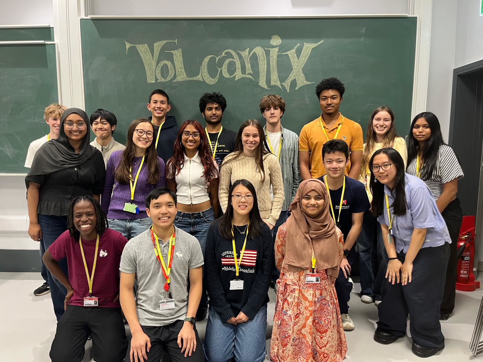 The KCLMS Volcanix team in front of a chalkboard with Volcanix written across it